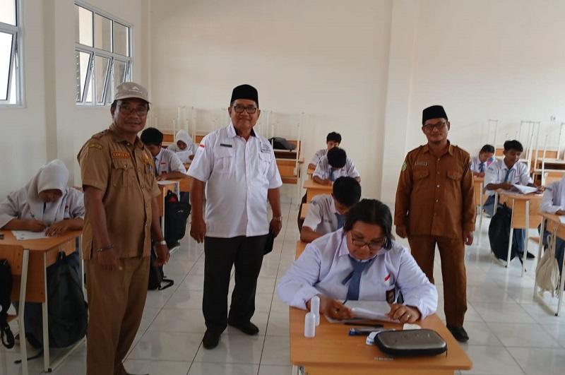 Pantau Ujian Akhir dan Pembangunan 8 RKB, Dewan Pendidikan Riau Kunker ke SMAN 9 Mandau