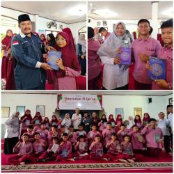 KWQ Wakafkan Mushaf Al-Qur’an untuk Hafidz-Hafidzah SD IP YLPI Pekanbaru